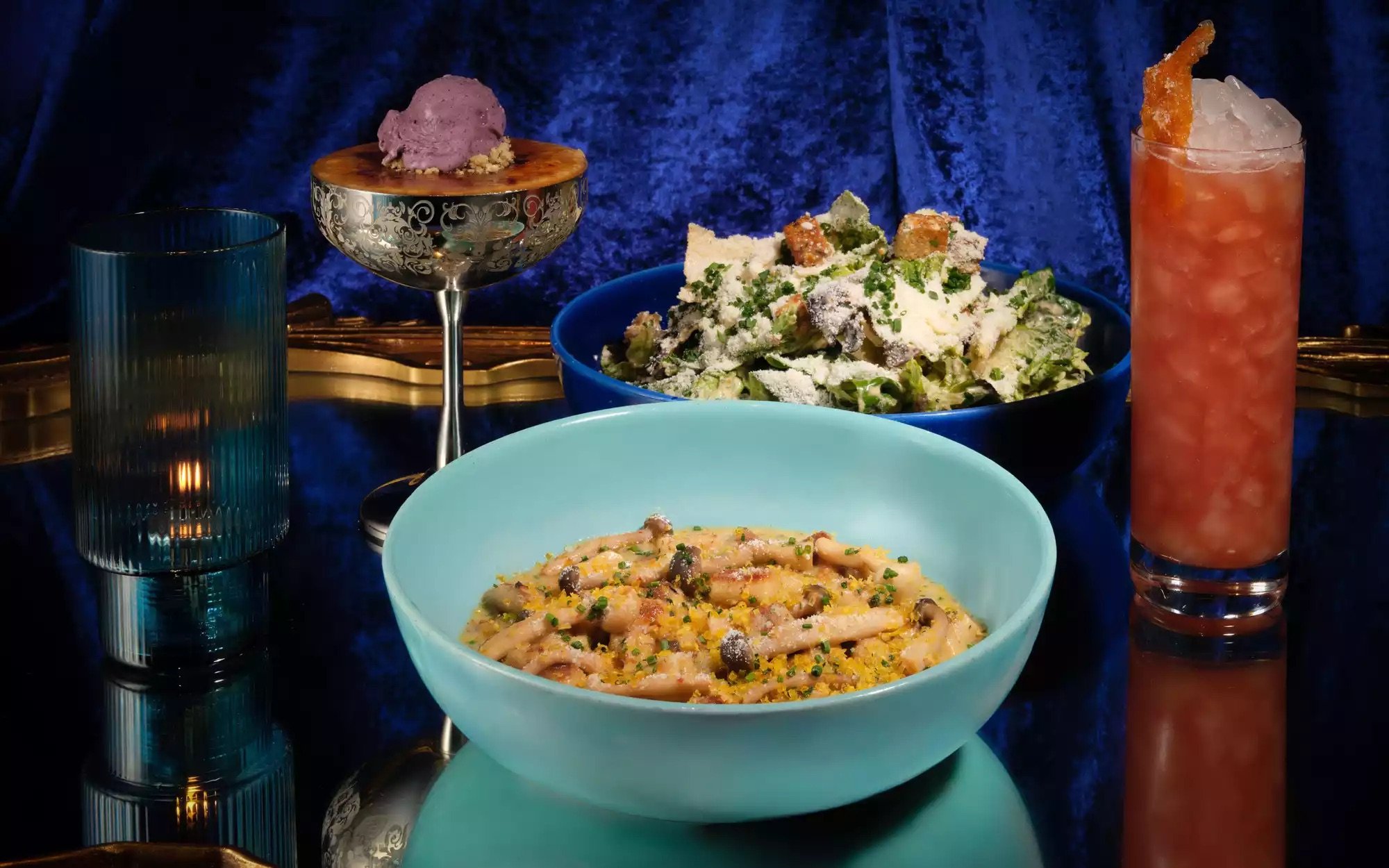 various dishes and cocktails on display